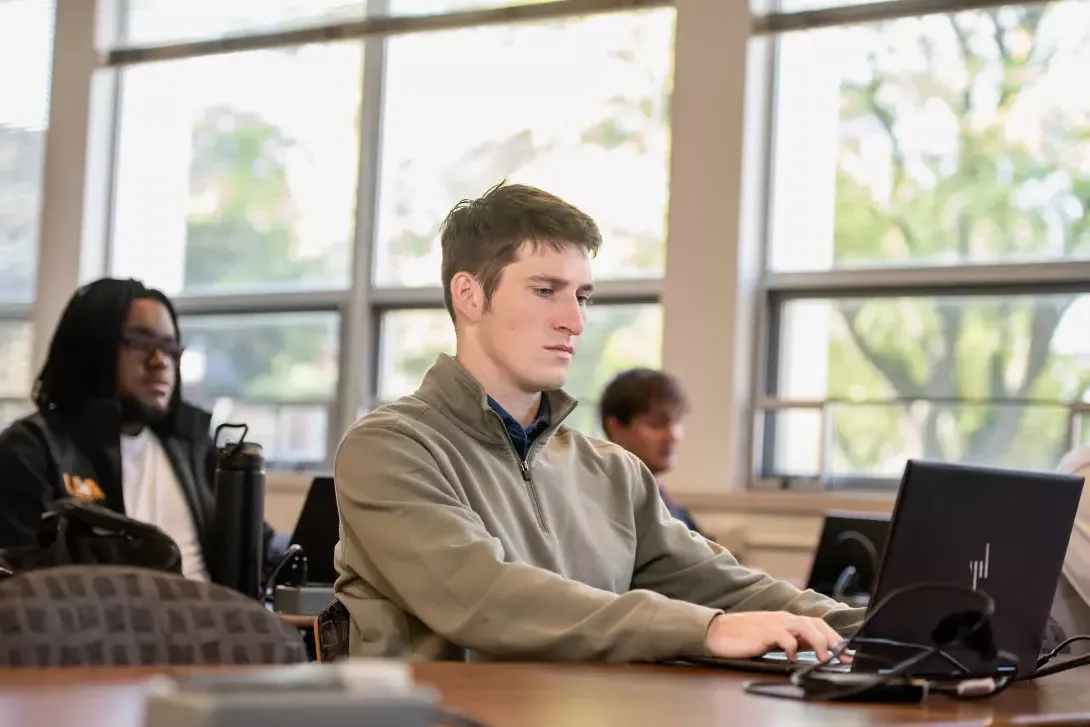 student working on laptop